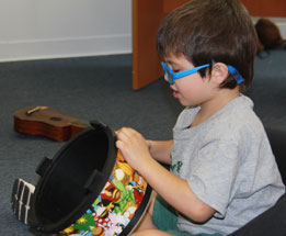 Kid playing with toy